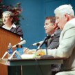 Seen at a candidates forum held Sept. 24, David Gantt, center, and J.B. Howard, right, are campaigning to become the next chairman of the Buncombe County Board of Commissioners. Matt Rose/Carolina Public Press